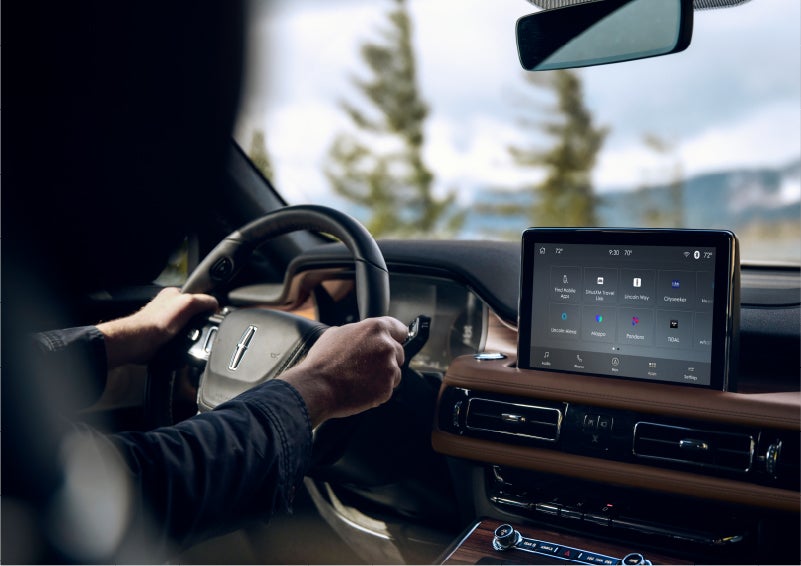 The Lincoln+Alexa app screen is displayed in the center screen of a 2023 Lincoln Aviator® Grand Touring SUV | Hines Park Lincoln in Plymouth MI