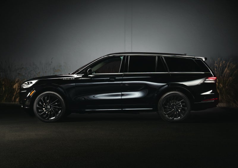 A 2024 Lincoln Aviator® SUV is shown in the Infinite Black exterior color | Hines Park Lincoln in Plymouth MI