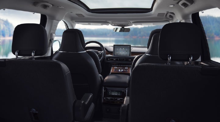 The interior of a 2024 Lincoln Aviator® SUV from behind the second row | Hines Park Lincoln in Plymouth MI