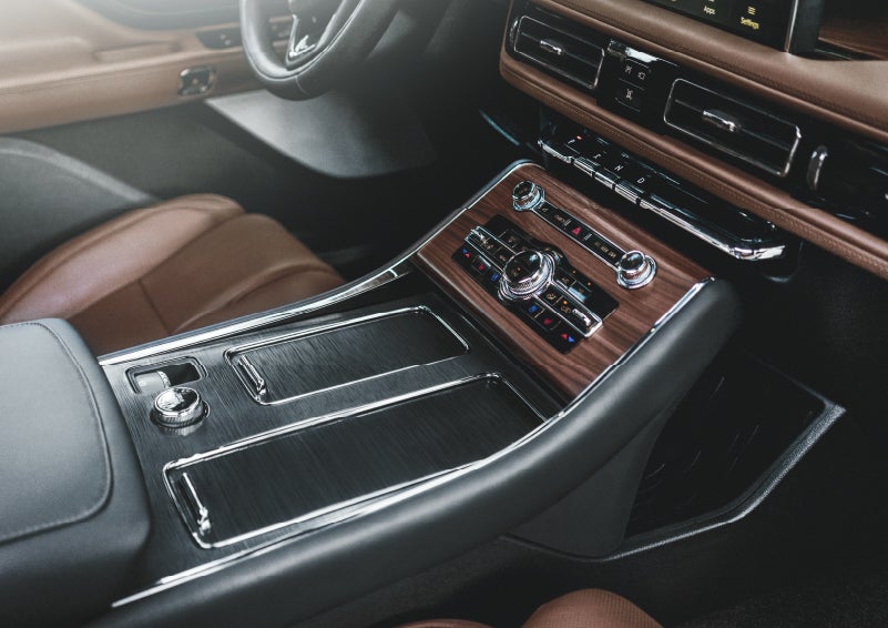 The front center console of a 2024 Lincoln Aviator® SUV is shown | Hines Park Lincoln in Plymouth MI