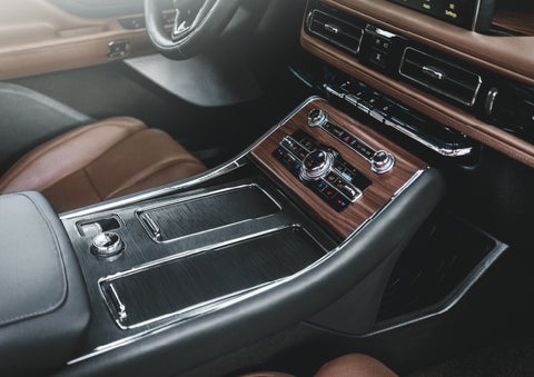 The front center console of a 2024 Lincoln Aviator® SUV is shown | Hines Park Lincoln in Plymouth MI