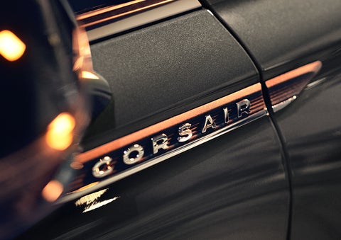 The stylish chrome badge reading “CORSAIR” is shown on the exterior of the vehicle. | Hines Park Lincoln in Plymouth MI