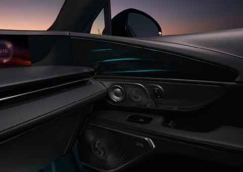 Selectable ambient lighting glows in the passenger door panel. | Hines Park Lincoln in Plymouth MI