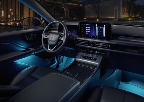 Deep blue Ambient Lighting glows from various places within a 2026 Lincoln Aviator® SUV. | Hines Park Lincoln in Plymouth MI