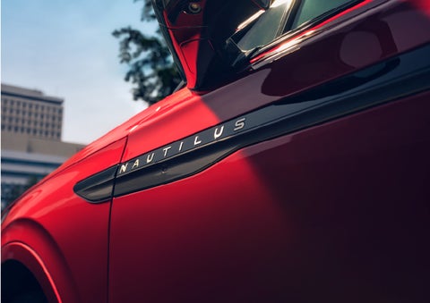 A side badge on the passenger door reads Nautilus. | Hines Park Lincoln in Plymouth MI