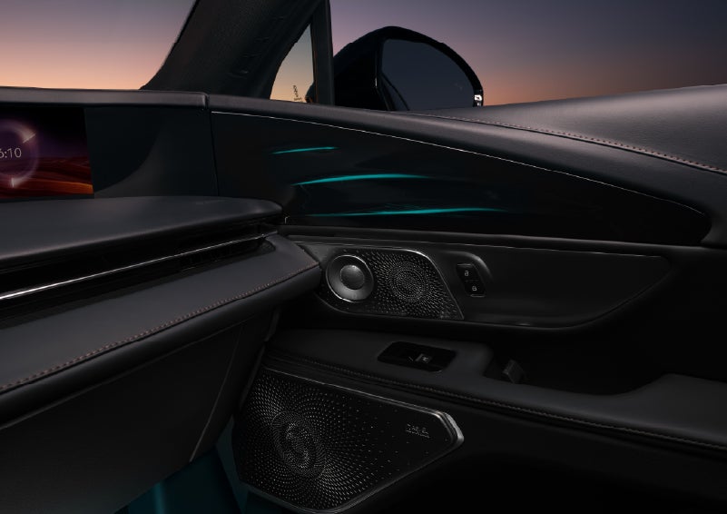 Selectable ambient lighting glows in the passenger door panel. | Hines Park Lincoln in Plymouth MI
