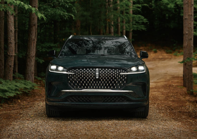 The front grille of a 2027 Lincoln Aviator® Black Label™ SUV is shown. | Hines Park Lincoln in Plymouth MI