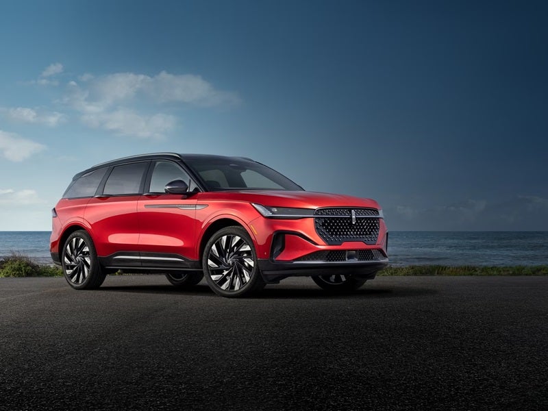 Lincoln Nautilus Hybrid SUV parked along the coastal water